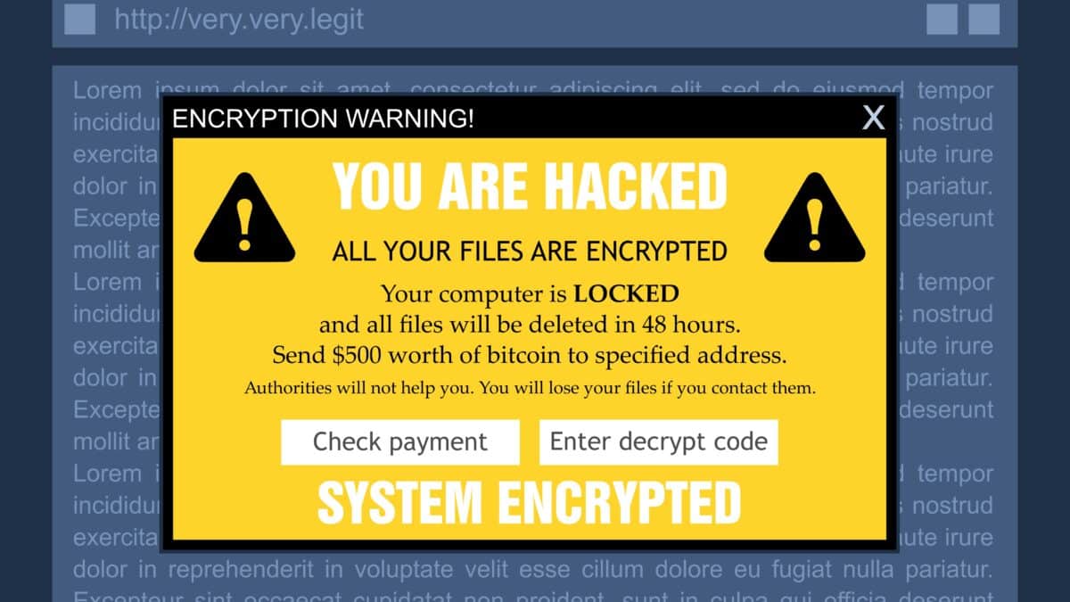 Ransomware warning screen: 'YOU ARE HACKED. All files encrypted. Send $500 Bitcoin to unlock.'