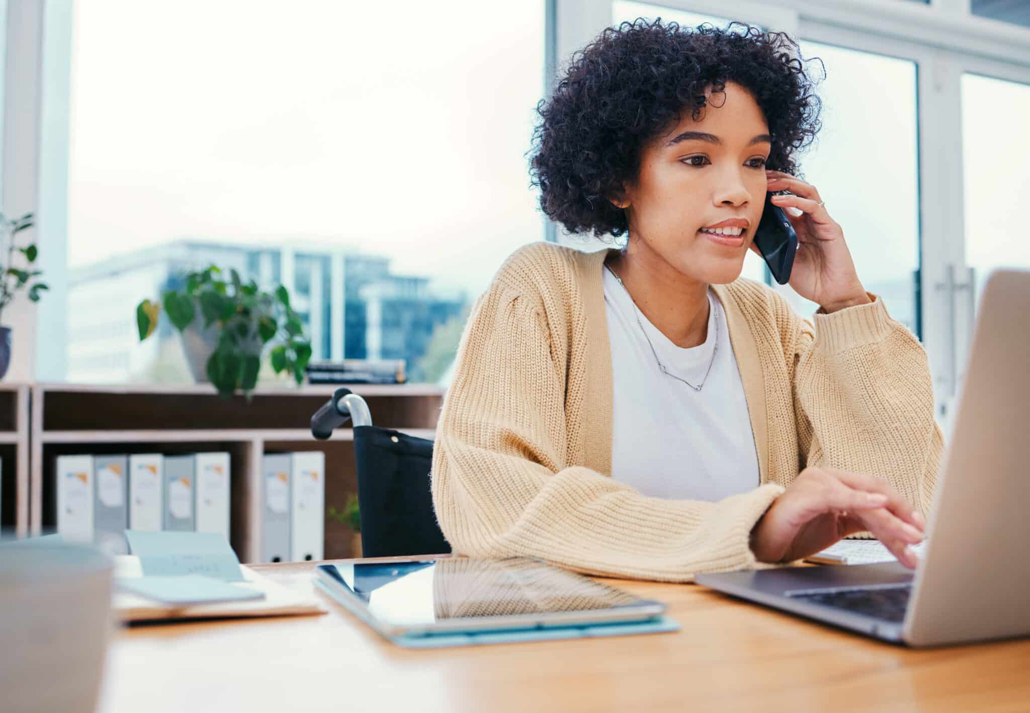 Manager discusses security policy development on phone with colleague to ensure cybersecurity.