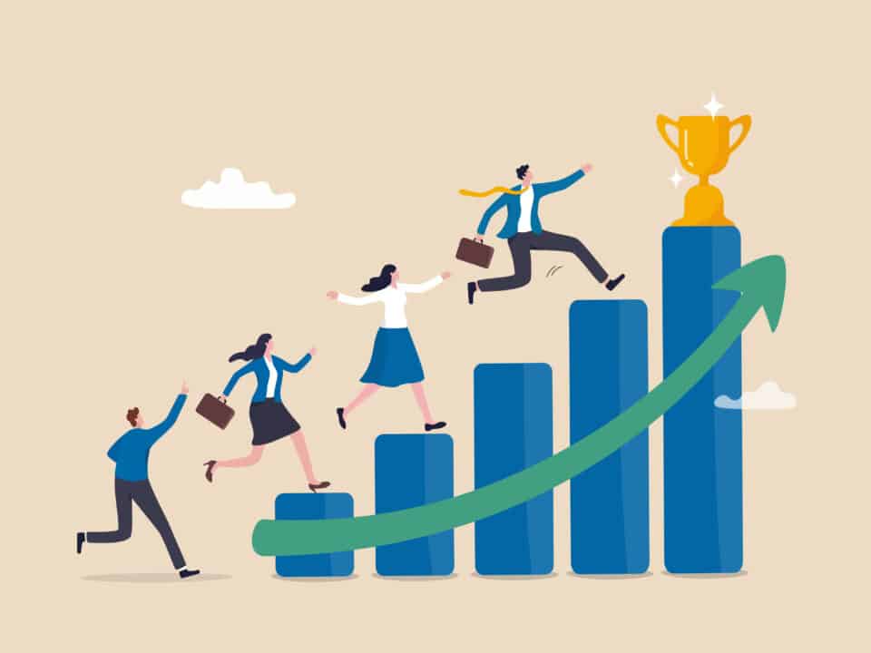 Business people climb graph bars towards a golden trophy; symbolizes success in AI medical scribes.